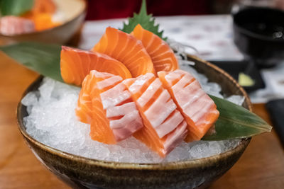 High angle view of chopped slices in plate on table