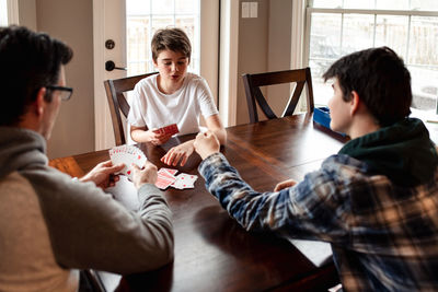 Father and son playing at home