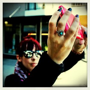 Portrait of woman holding smart phone