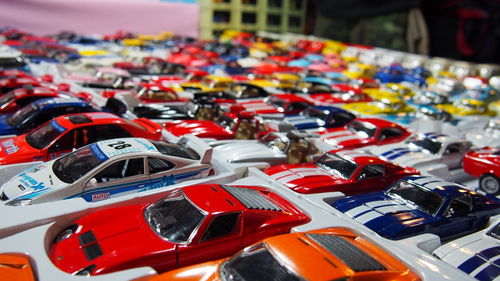 Close-up of cars in parking lot