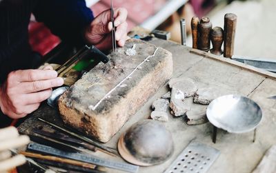 Close-up of jeweller at work