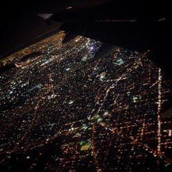 Aerial view of illuminated cityscape