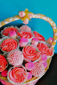 Close-up of pink flowers over black background