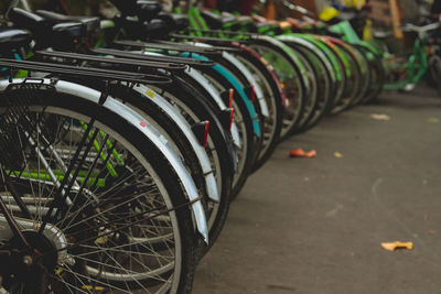 Close-up of bicycle parked on street