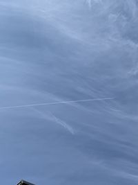 Low angle view of vapor trail in sky