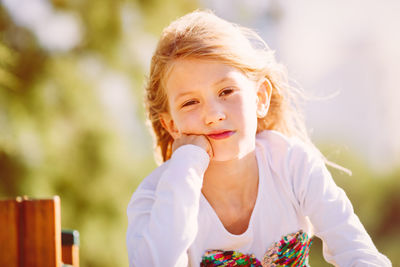 Portrait of cute girl outdoors