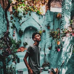 Young man looking away outdoors