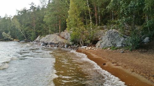 Scenic view of rock formation in sea