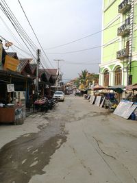 View of market in city against sky