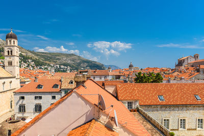 Residential district against blue sky