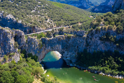 High angle view of natural arch over river