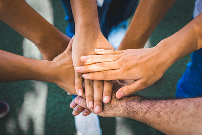 Midsection of man holding hands