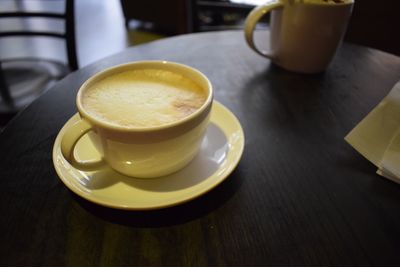 Close-up of coffee cup on table