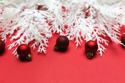 Different christmas decorations on the red background. high quality photo