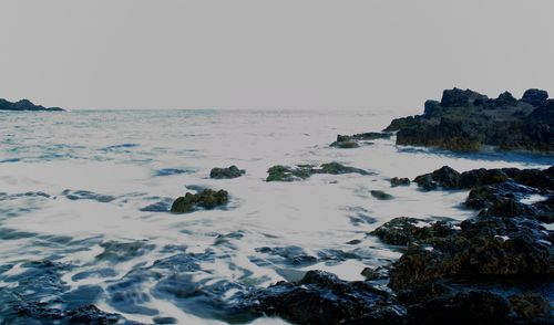 Scenic view of sea against clear sky