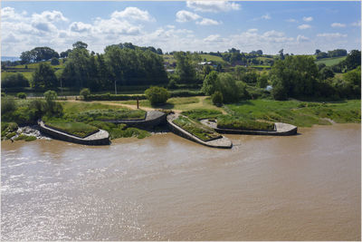 Scenic view of river against sky