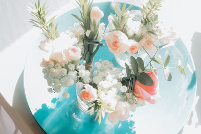 High angle view of flower bouquet on white table