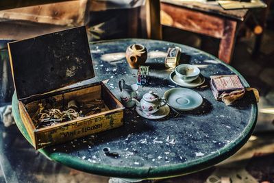 High angle view of old equipment on table