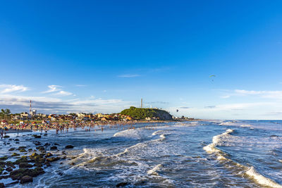 Summer sunset on the beach in the city of torres on the coast of rio grande do sul