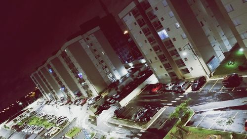 Aerial view of illuminated city at night