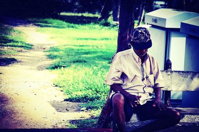 Woman standing on grass