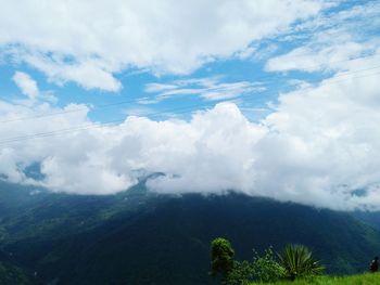 Aerial view of mountains against sky