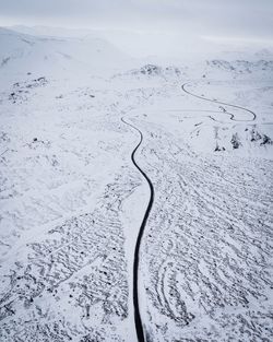 High angle view of snow covered field