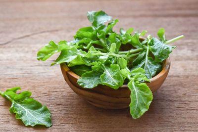 High angle view of green leaves on table