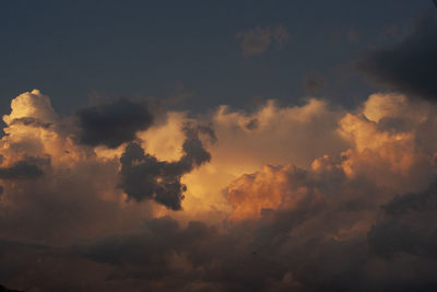 Low angle view of dramatic sky during sunset