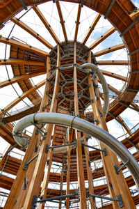 Low angle view of ferris wheel in city