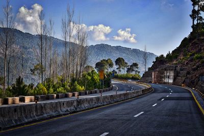 Mountain road against sky