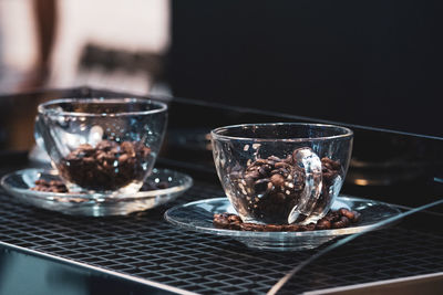 Close-up of coffee in glass on table