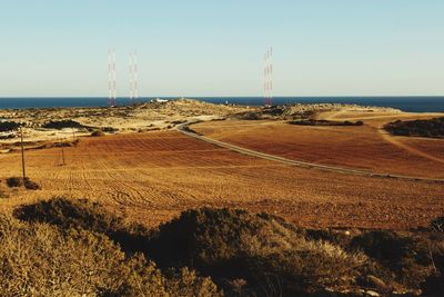 Scenic view of beach against clear sky