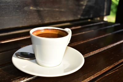 High angle view of coffee cup on table
