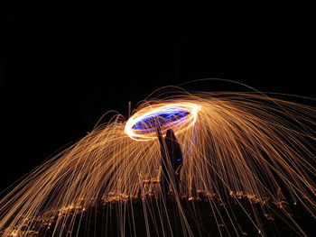 Light painting of firework display at night