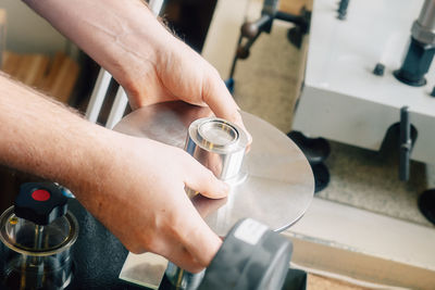 Cropped hand of man washing hands