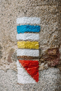 Close-up of flag on wall
