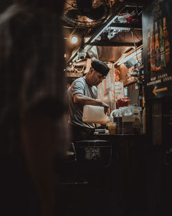 Man working at dusk