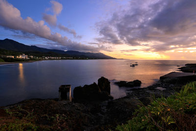 Scenic view of sea against sky during sunset