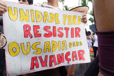 Women are seen protesting during the women day march in the city of salvador, bahia.