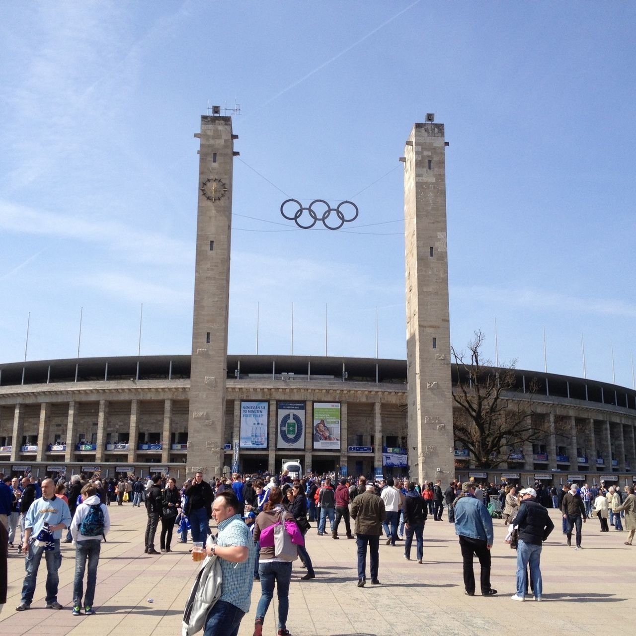 architecture, built structure, building exterior, large group of people, famous place, person, men, city, travel destinations, tourism, walking, tourist, international landmark, city life, travel, history, capital cities, sky, architectural column