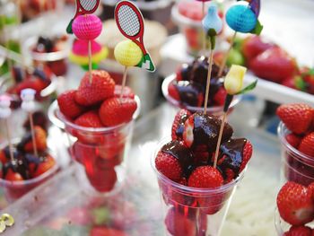 Close-up of strawberries on glass table