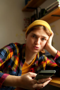 Young woman using mobile phone