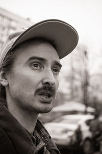 Portrait of young man wearing hat