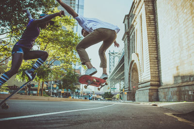 Man jumping in front of building