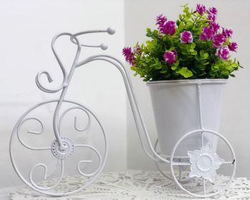 Close-up of flower pot on table