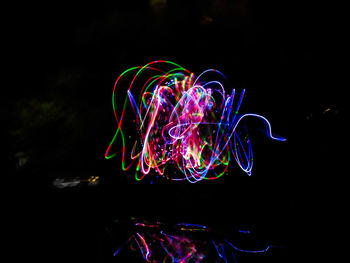 Light painting against black background