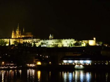 Reflection of illuminated buildings in water