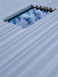 Low angle view of building against cloudy sky