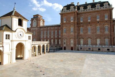 Facade of historic building against sky